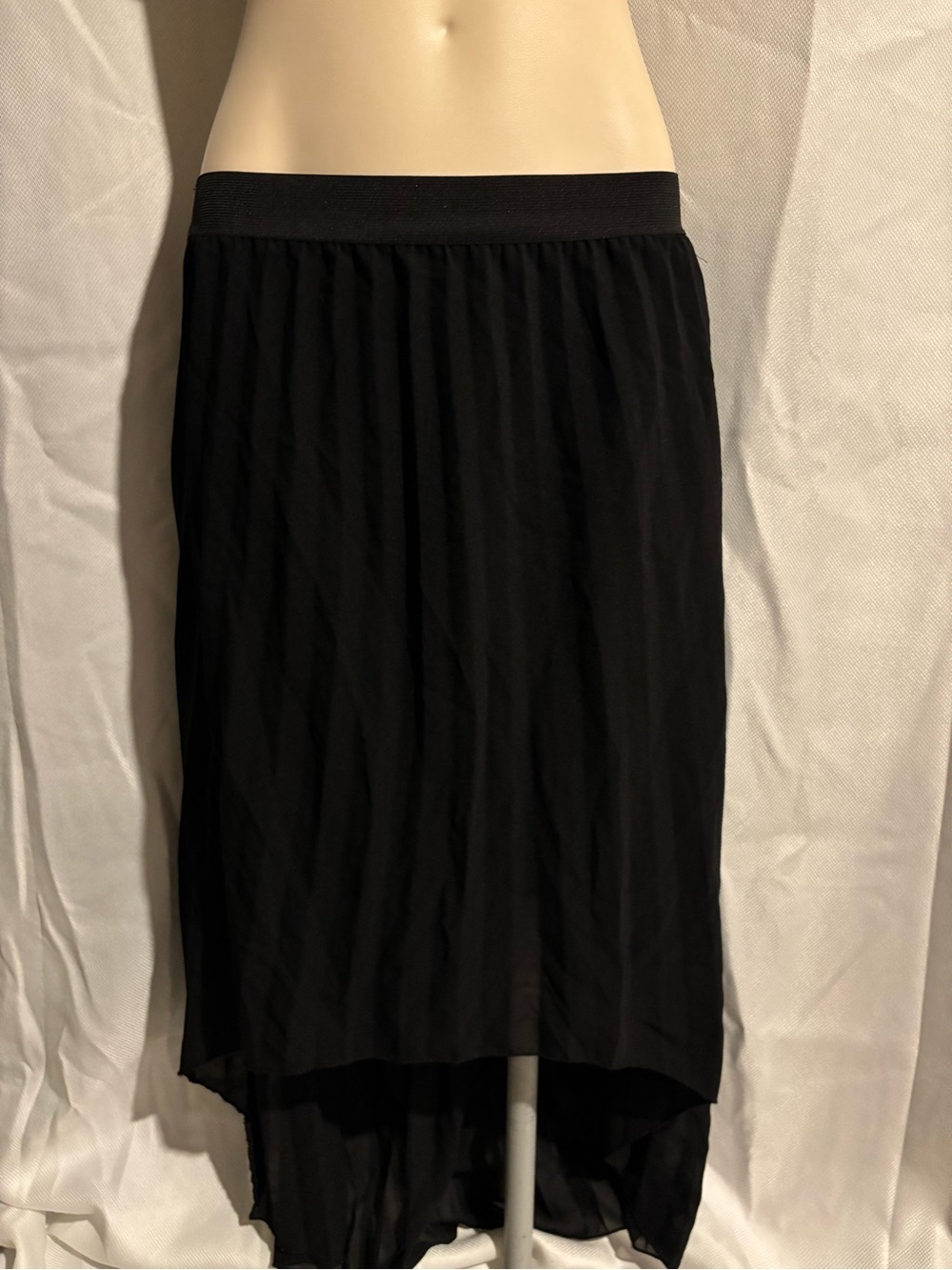 flowy black pleated skirt